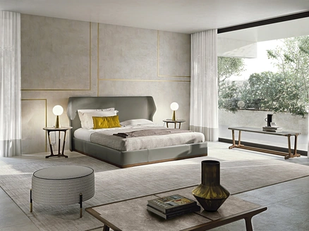 Letto matrimoniale con testiera completamente rivestito in cuoio con base in legno massello Agio di Frigerio