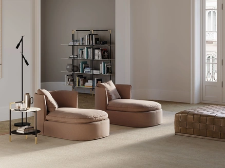 Poltrona dalle forme morbide in tessuto imbottito Bessie Longue di Frigerio