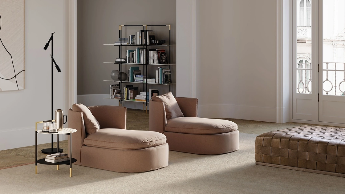 Poltrona dalle forme morbide in tessuto imbottito Bessie Longue di Frigerio