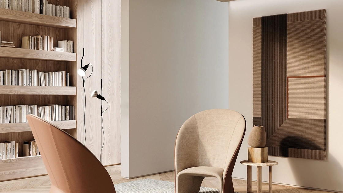 Poltrona di design Mayu in tessuto e pelle di Frigerio