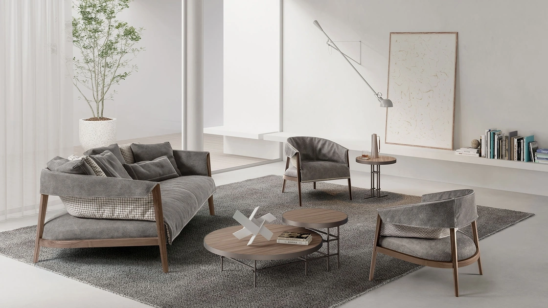 Divano lineare in pelle e tessuto con struttura in legno massello Burton di Frigerio