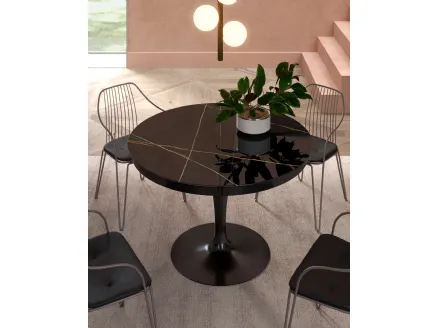 Tavolo rotondo allungabile Eclipse con top in marble glass Sahara Noir Lucido di Ozzio