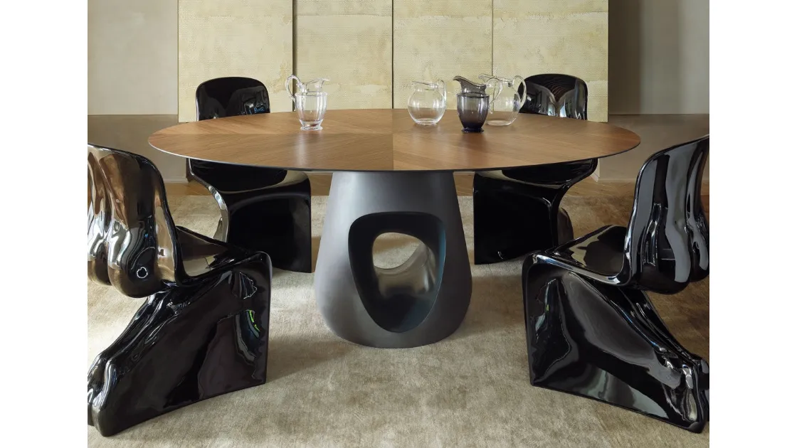 Tavolo rotondo con top in legno di Noce e basamento in cemento Barbara Legno di Horm
