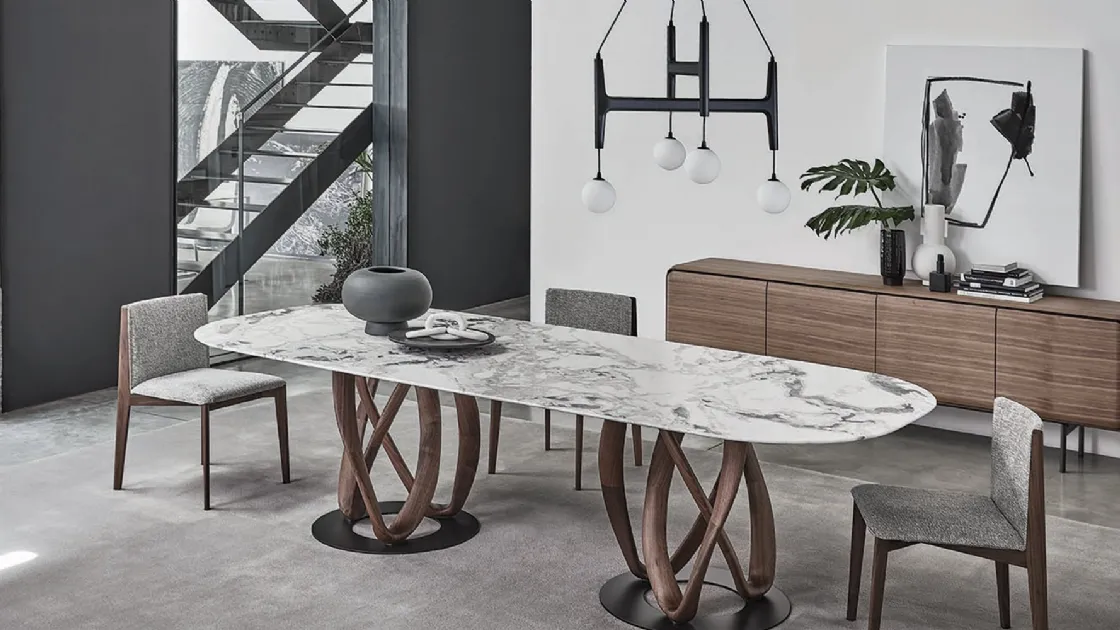 Tavolo ovale con piano in marmo e base in legno massello Infinity di Porada